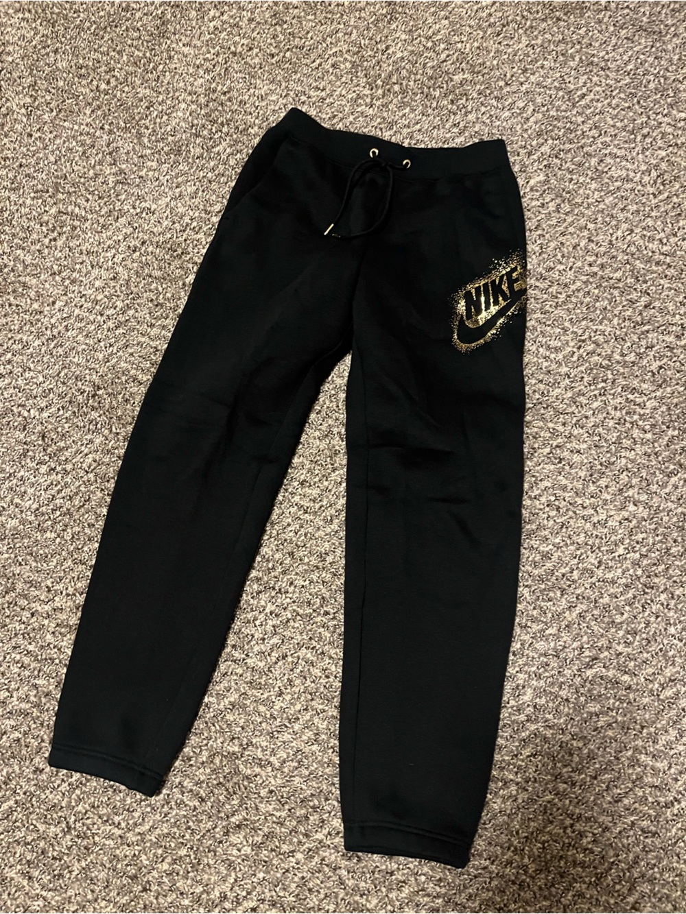 Nike Women’s Black Jogger Sweatpants with Gold Logo Accent